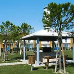 Apartment In Villaggio Ai Pini In Lido Altanea